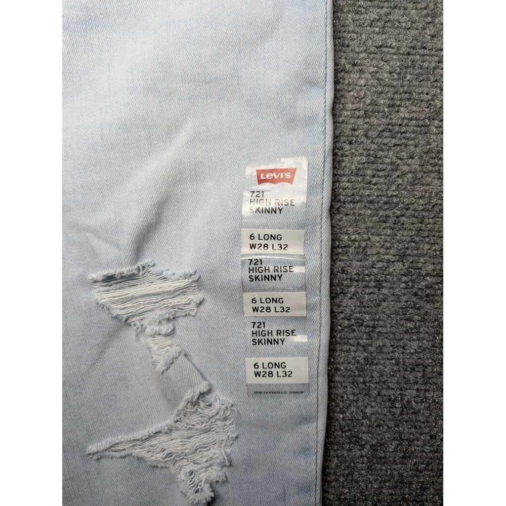 NWT Levi's 721 High Rise Skinny Light Wash Jeans Women's 28 W/ 32 L Hole Legs - Picture 2 of 10